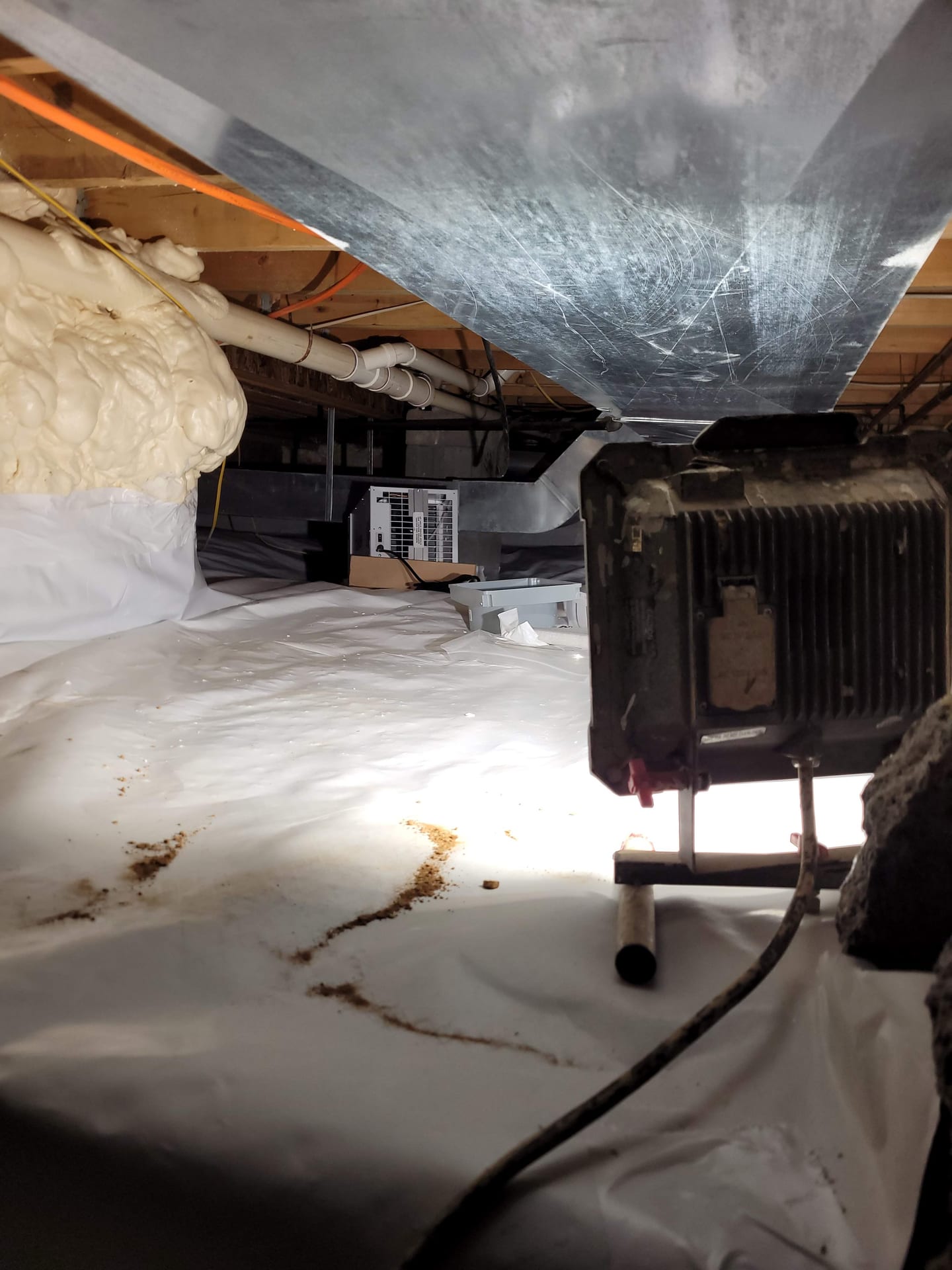 Crawl space encapsulation and vapor barrier installation